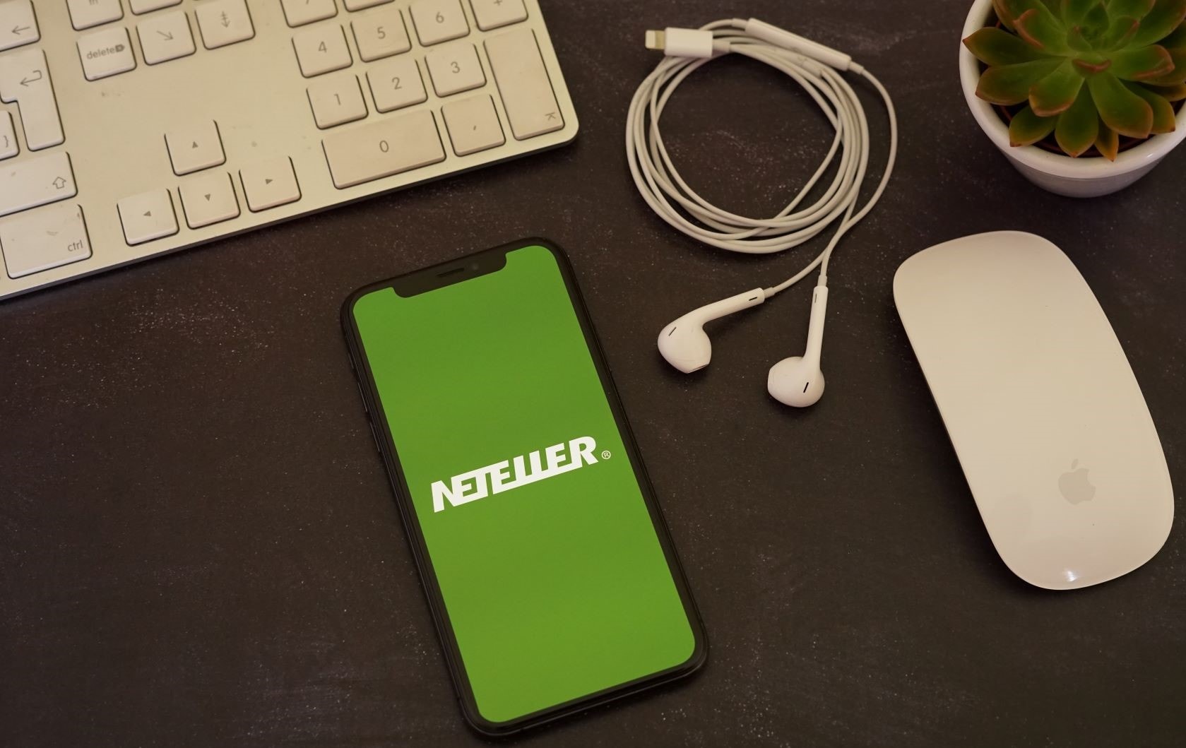 Neteller-mobil-laptop-casino